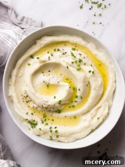 Cauliflower Mash with Ricotta and Roasted Garlic - tastes just like mashed potatoes but with fraction of the carbs!
