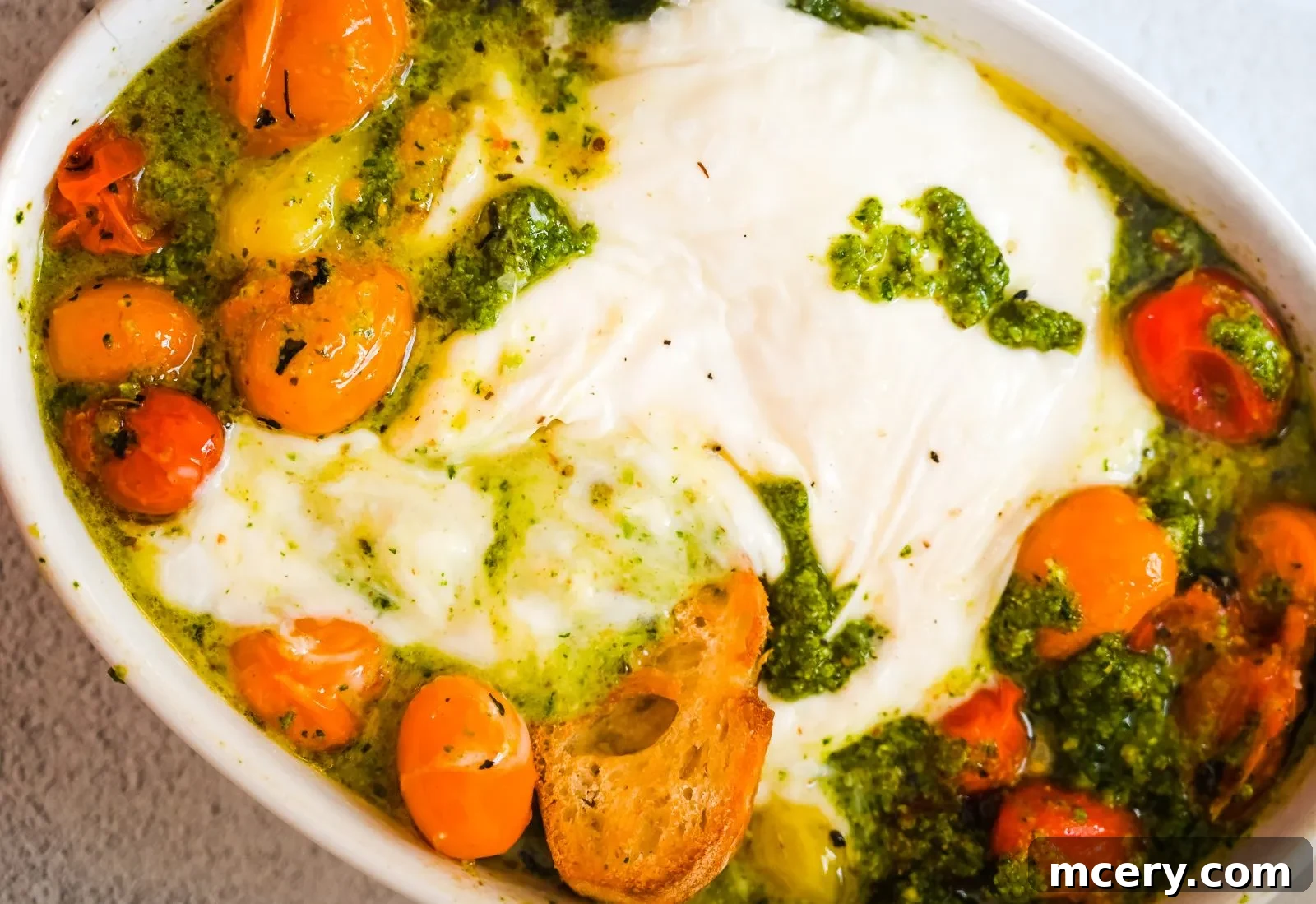 Velvet Burrata with Roasted Tomatoes and Fiery Pesto 3 Close-up of freshly made spicy pesto in a small blender