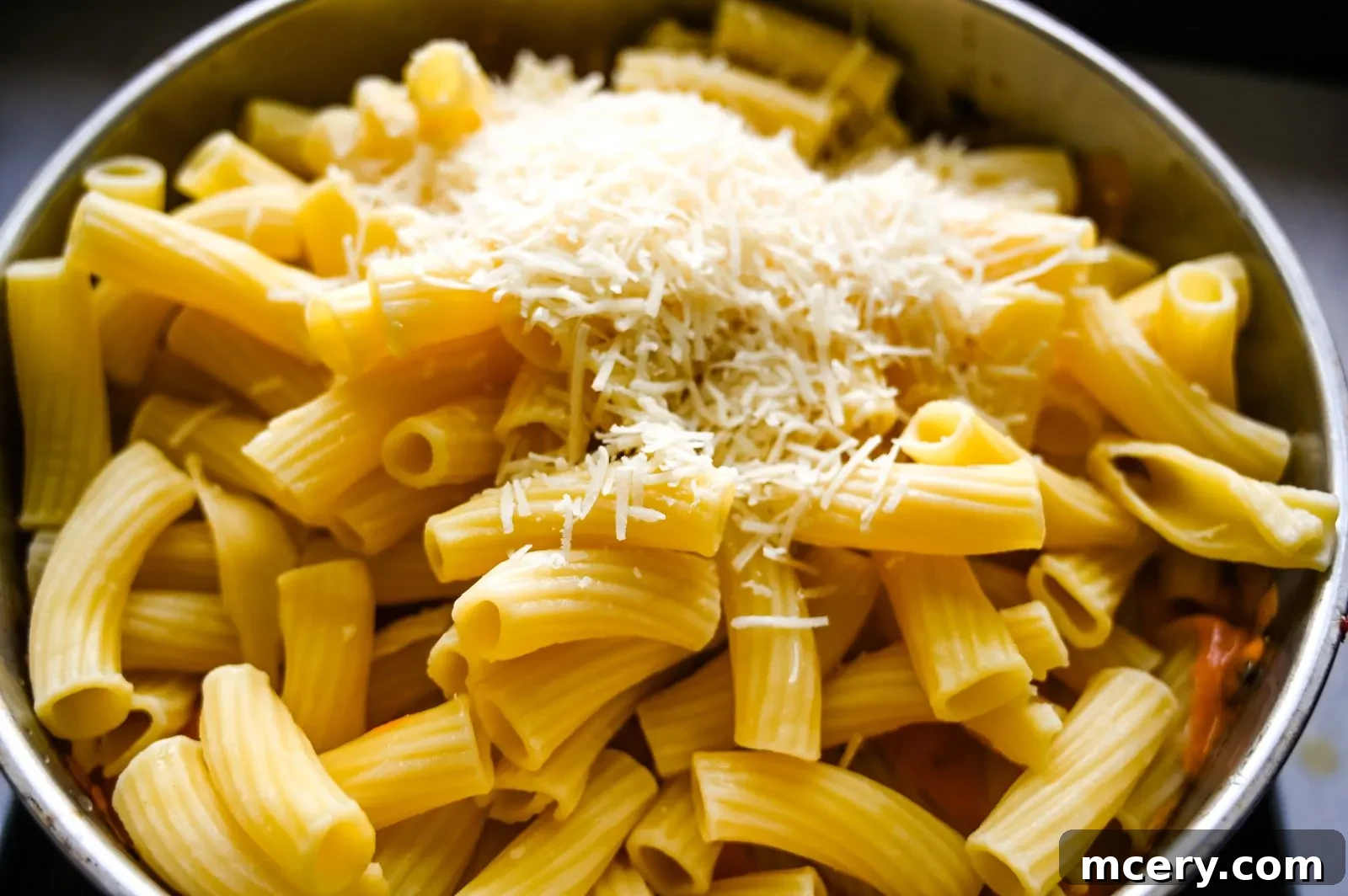 Gigi Hadid's Signature Spicy Vodka Pasta 8 Gigi Hadid Pasta sauce simmering to perfection, thickening and melding flavors.