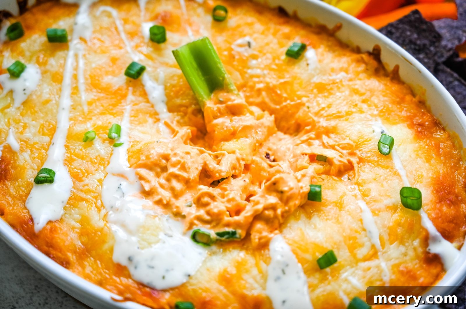 Ultimate Game Day Chicken Dip 5 A freshly baked Buffalo Chicken Dip, ready to be served.