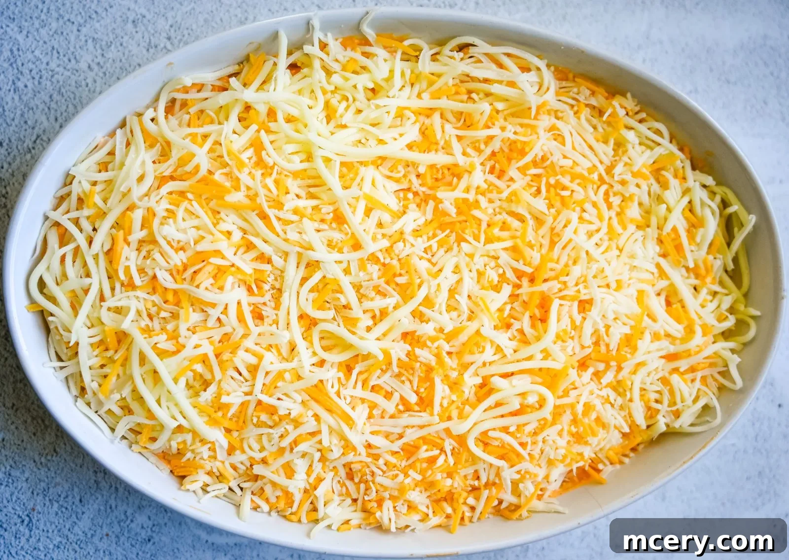 Ultimate Game Day Chicken Dip 10 A spoonful of Buffalo Chicken Dip, showing its creamy texture.