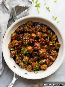 Mini Asian Chicken Meatballs - tender chicken meatballs in a delicious asian inspired sauce. SO good for the holidays! | littlebroken.com @littlebroken