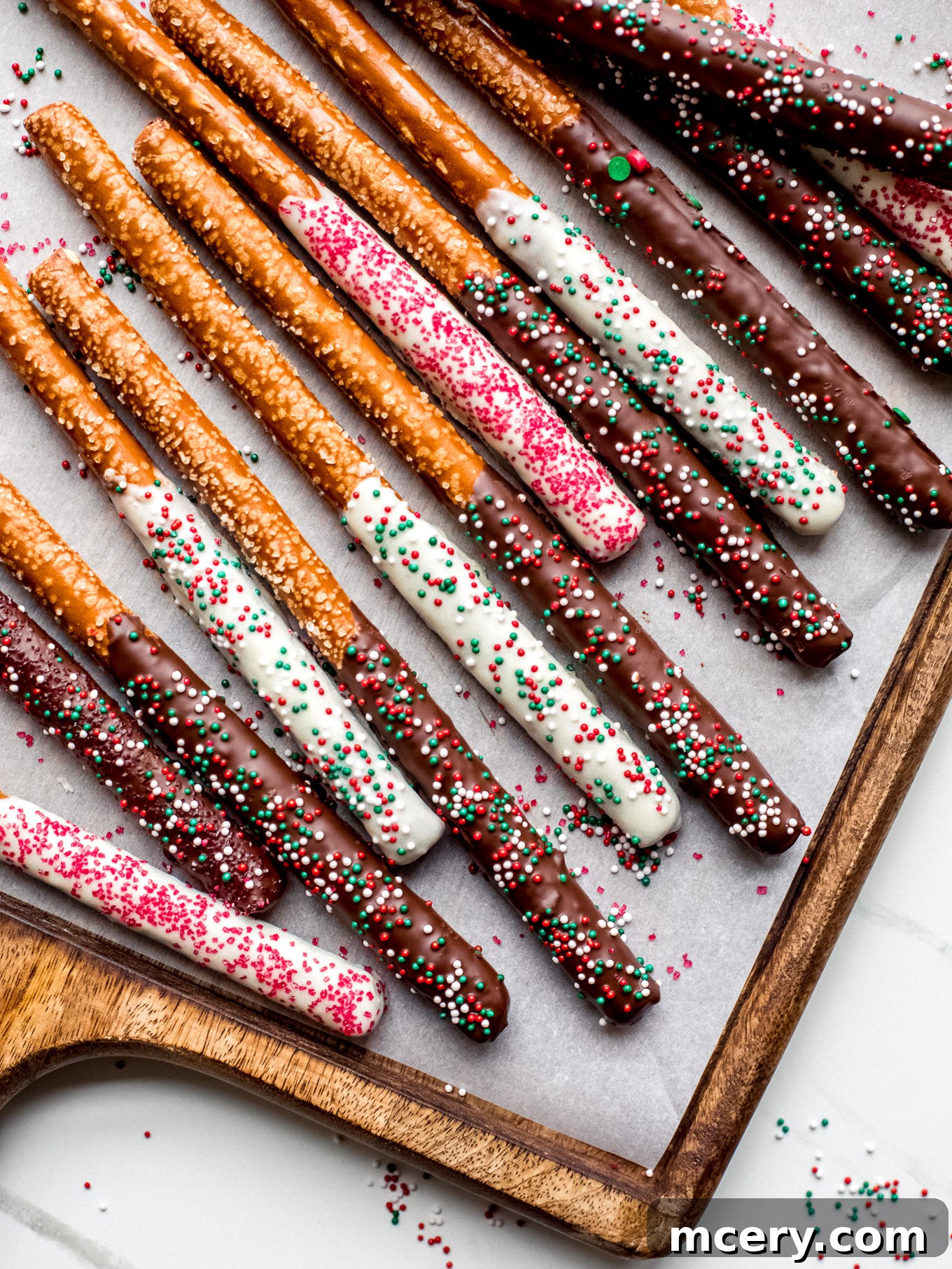 Festive Christmas Chocolate Covered Pretzels on a tray