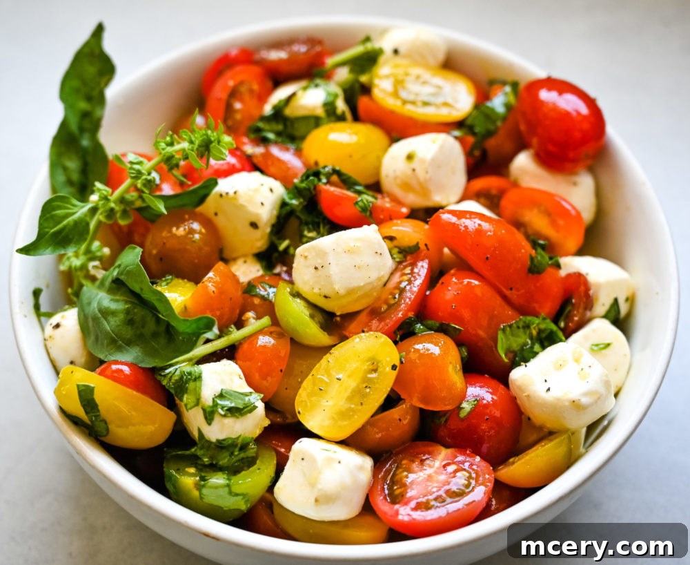 Cherry Tomato Caprese Salad - A vibrant dish with cherry tomatoes, mozzarella, and basil
