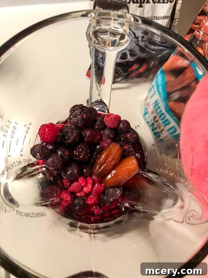 Close-up of a rich, deep red berry smoothie, packed with antioxidants and natural goodness.