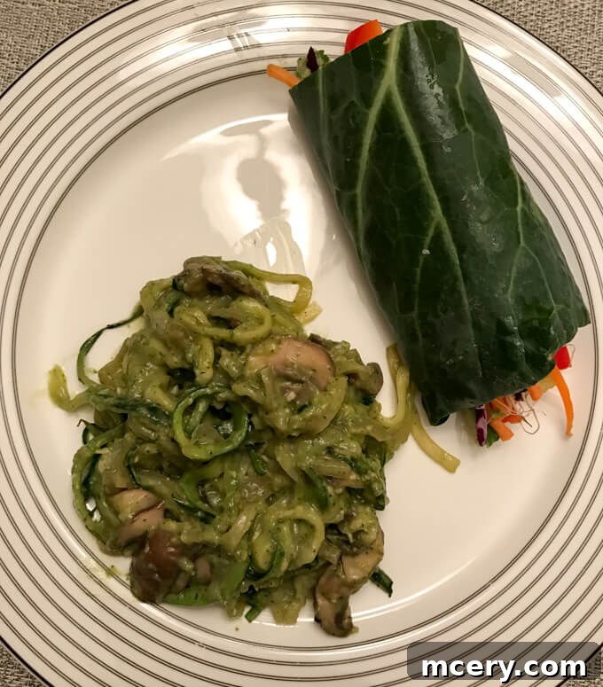 Zucchini noodles with creamy avocado pesto sauce, sautéed mushrooms, and fresh veggies for a nutritious and light dinner.