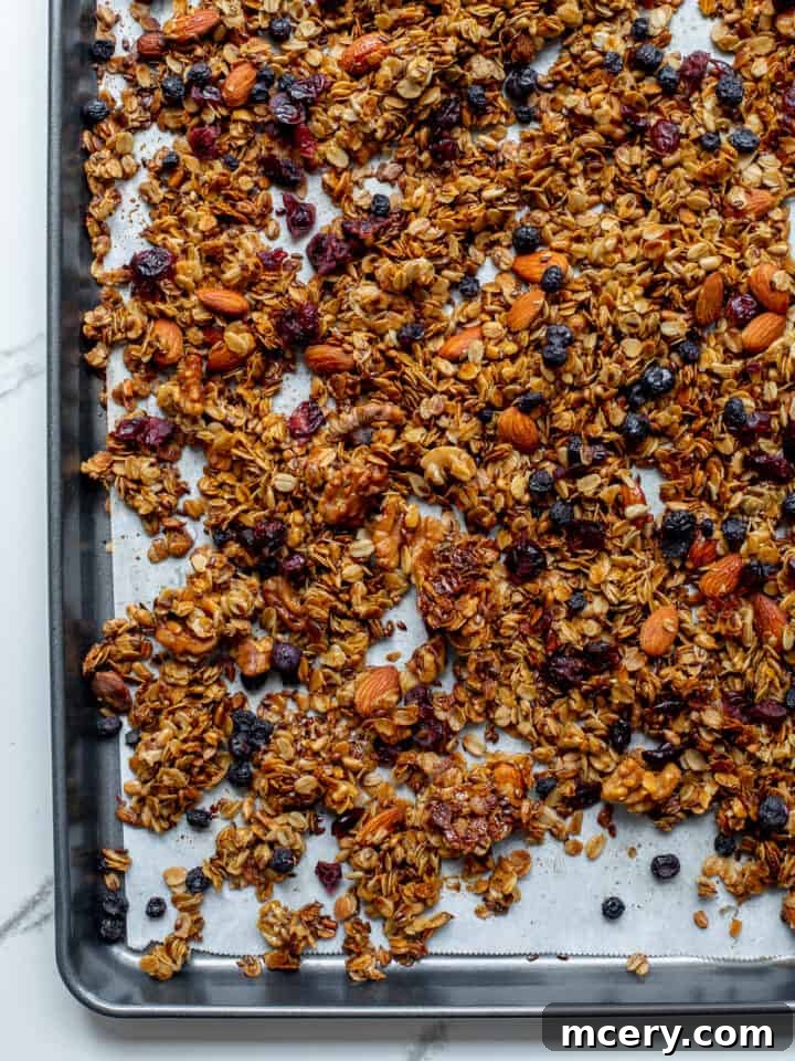 Addictive Crunchy Granola 2 crunchy granola recipe on a baking sheet