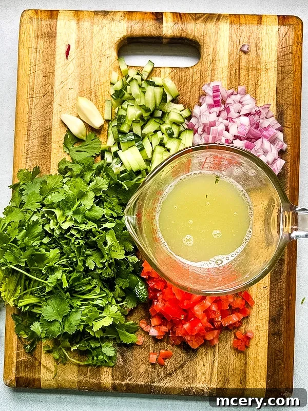Aguachile: Mexico's Fiery Seafood Ceviche 4 Aguachile ingredients being prepped on a cutting board