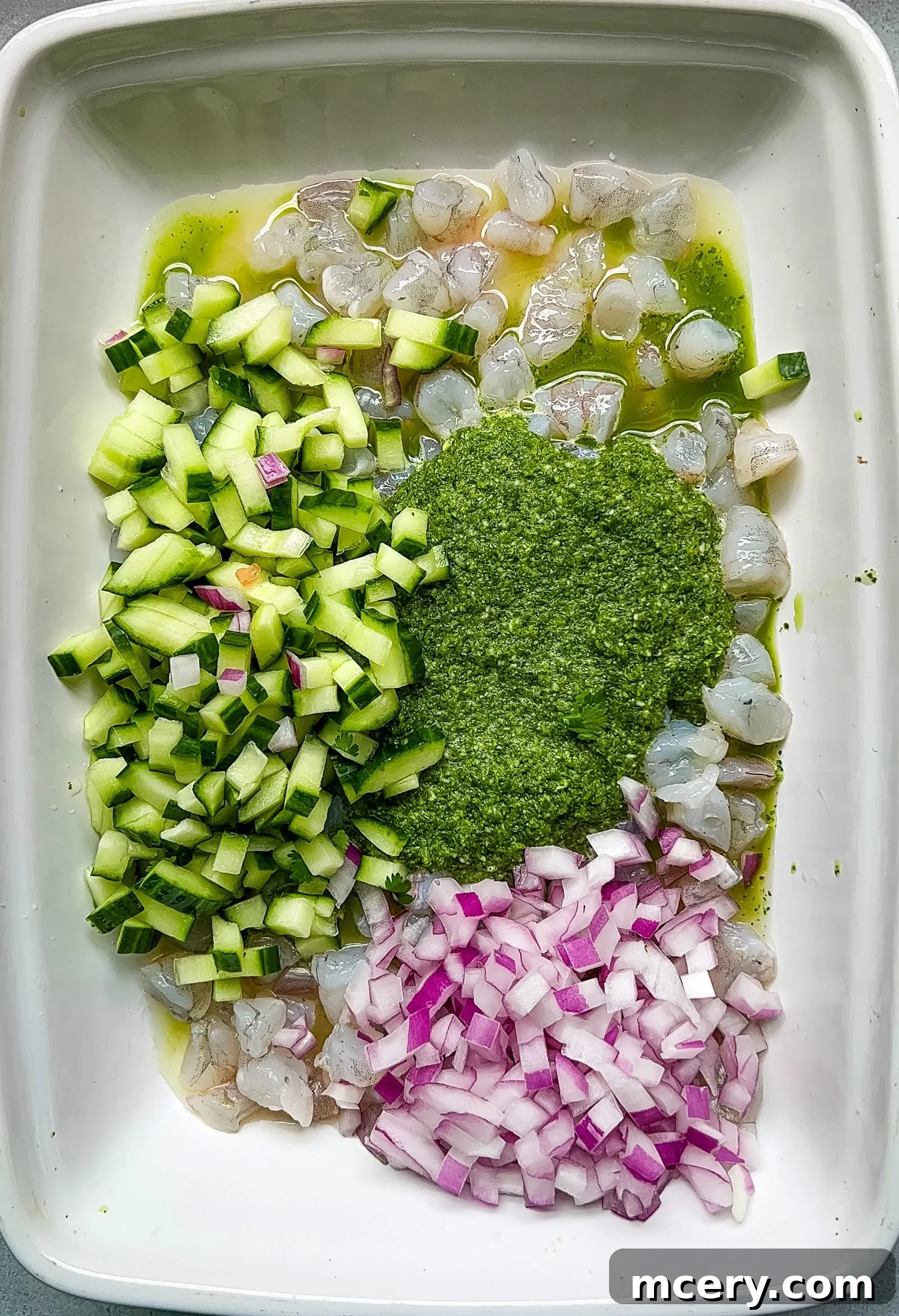 Aguachile: Mexico's Fiery Seafood Ceviche 6 Aguachile in a glass bowl with colorful vegetables