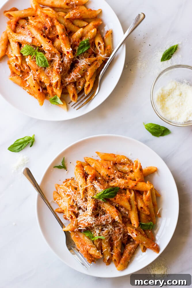Creamy Vodka Pasta Perfection 2 Exquisite homemade creamy pink vodka sauce, lightened up and perfect for coating pasta, chicken, or shrimp. This easy recipe promises a rich, restaurant-quality flavor far superior to store-bought options.