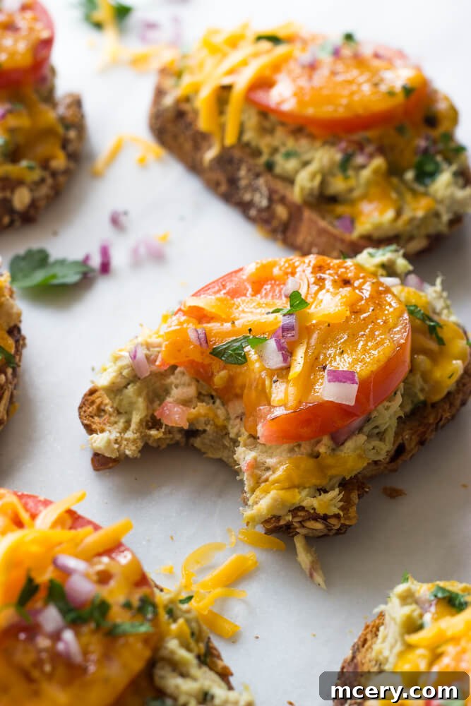 Creamy Avocado Tuna Melt 6 A healthy tuna melt sandwich featuring creamy avocado, melted cheese, and whole-grain bread.
