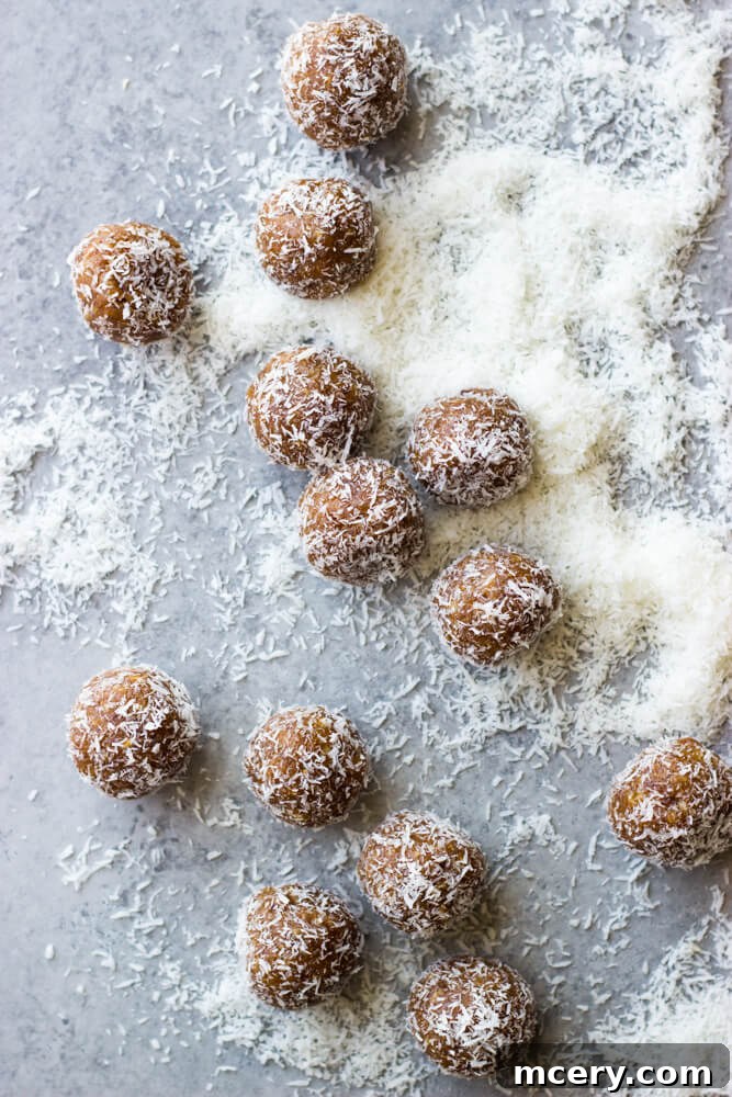 Date Coconut Truffles 2 close-up view of frosted date coconut balls on a plate
