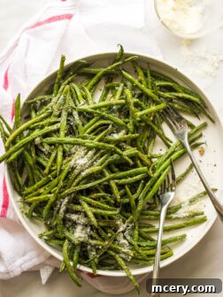 Roasted Garlic Green Beans - only 4 ingredients to make these addictive green beans! | littlebroken.com @littlebroken