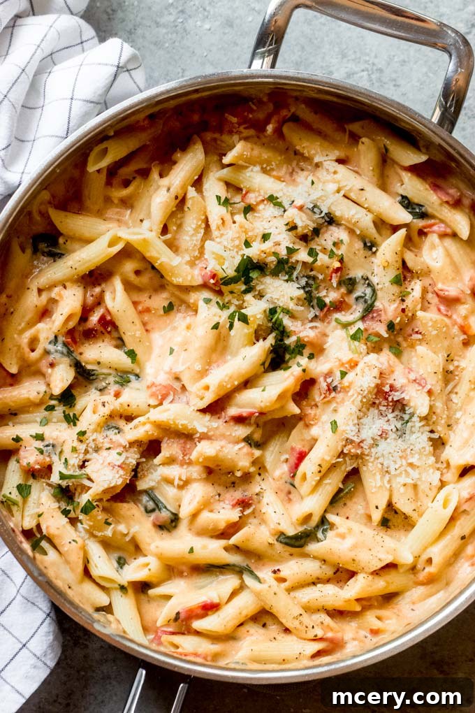 Delightful pasta with a vibrant fresh tomato cream sauce, perfect for a quick and comforting meal.