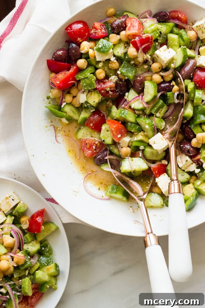 Mediterranean Chopped Salad 6 Overhead view of a beautifully prepared Greek salad with avocado, olives, and feta