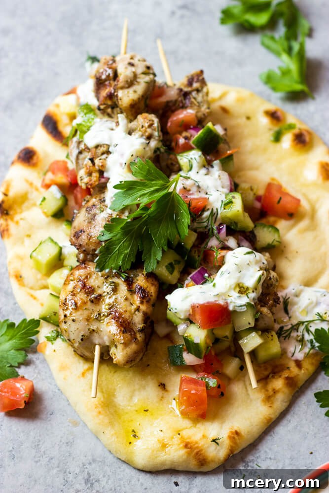 Homemade Chicken Gyro Perfection 10 Close up shot of a finished Greek chicken gyro on a gray board, ready to be served.