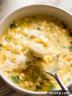 Fresh Corn and Crab Chowder - lightened up chowder with half and half, no flour, fresh sweet corn, and lump crab meat! It's a must have one-pot summer meal
