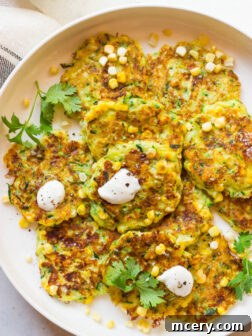 Zucchini and Corn Fritters - light, yet loaded with SO much flavor! Made with sweet summer corn and zucchini | littlebroken.com @littlebroken