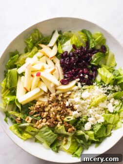 Apple Crunch Salad - a simple yet flavorful fall salad with apples, walnuts, and cranberries, perfect with any meal.