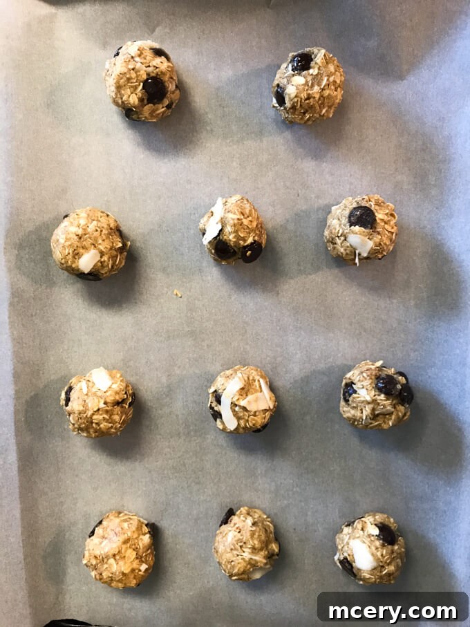 Postpartum Fuel What I Ate Plus Lactation Cookie Recipe 16 Rolled up lactation cookie dough on parchment lined baking sheet