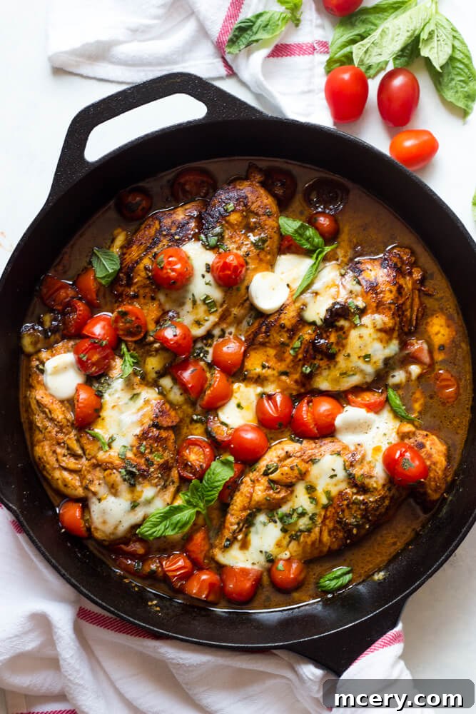 One Pan Balsamic Chicken, showing a serving on a plate with fresh basil garnish, highlighting the succulent chicken breast, melted mozzarella, and glistening balsamic glaze. | littlebroken.com @littlebroken