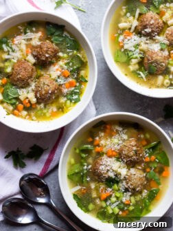 Easy Italian Wedding Soup - hearty soup with meatballs, pasta, and spinach. Comes together in about 30 minutes