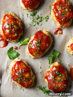 Mini Chicken Meatloaves - insanely juicy and tender mini meatloaves made with chicken and italian sausage | littlebroken.com
