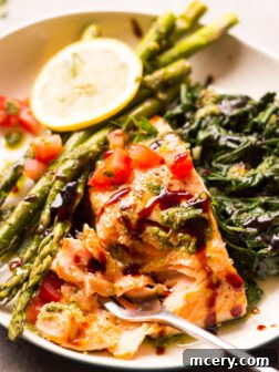 Baked Balsamic Salmon with Asparagus - perfect for date night in or company. This salmon dinner comes together in about 30 minutes.