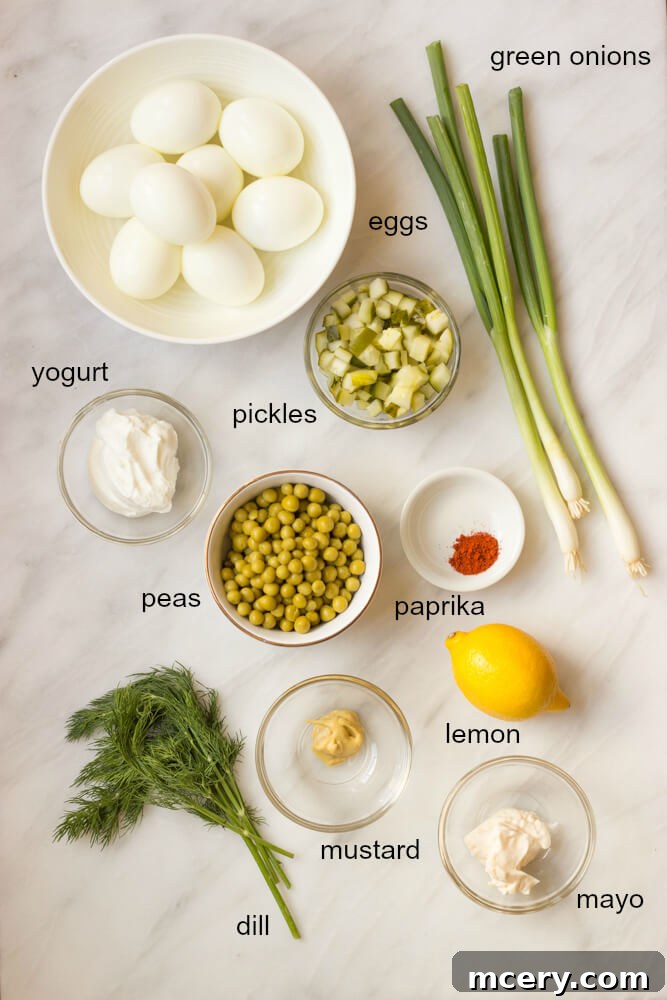 Creamy Greek Egg Salad 3 Ingredients laid out for Greek yogurt egg salad