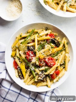 Pasta Primavera with Roasted Vegetables - roasted vegetables tossed with hot pasta and tomato herb sauce for an easy weeknight meatless meal